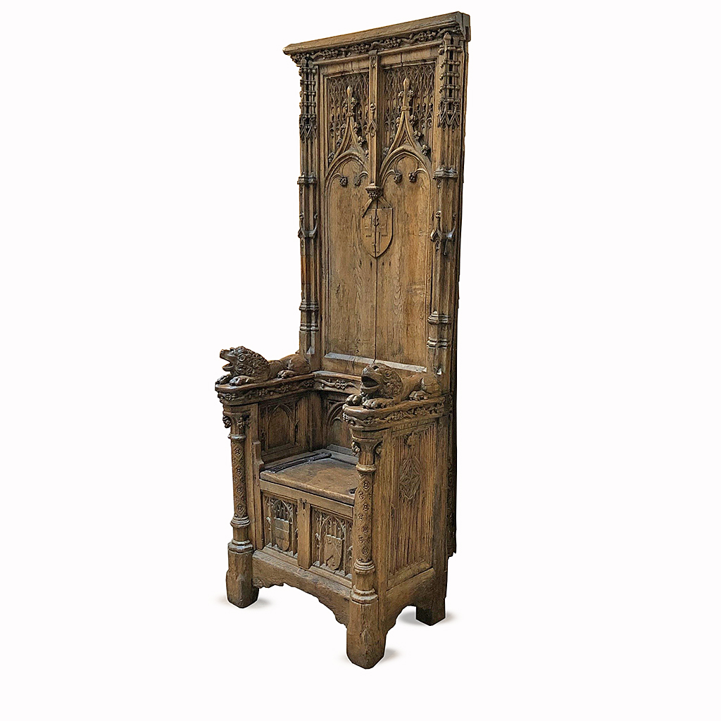 FRENCH OR FLEMISH CARVED OAK THRONE CHAIR 16TH CENTURY OF LARGE PROPORTIONS WITH CARVED HERALDIC BACK AND RECUMBANT LION ARMS 223 CM HIGH 81 CM WIDE 54 CM DEEP